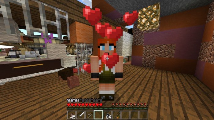 Give a cake to the male and female villager to make them breed